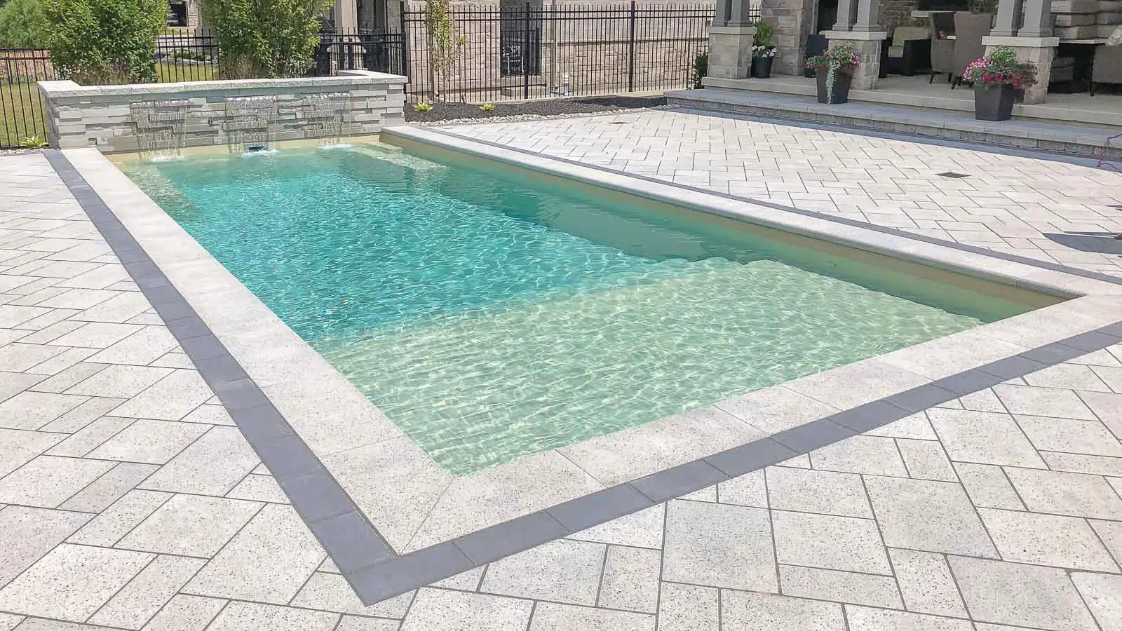 The Summit™, a fiberglass pool design manufactured by Leisure Pools